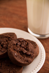 Chocolate cookies piled on plate