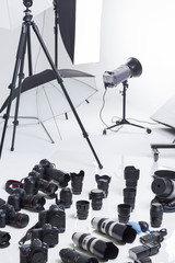 Many cameras and lenses in studio