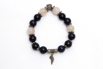 bracelet mix lucky bluesand stone and golden Rutillated Quartz  with white isolate background