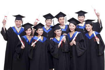 Portrait of graduates holding diploma 