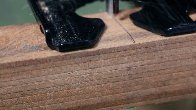 Jigsaw cutting wood side angle

