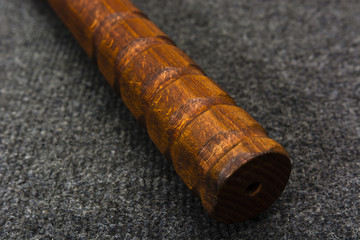 wooden handle with engraved recesses