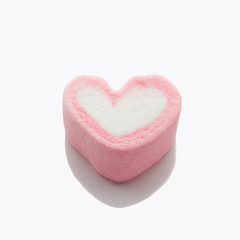 Obraz na płótnie Canvas One marshmallow in heart shape valentine concept
