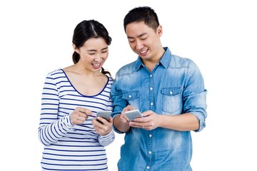 Couple using smartphone