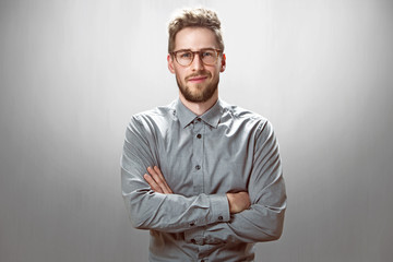 Smiling Businessman with glasses - obrazy, fototapety, plakaty
