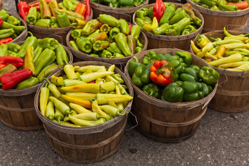 Pepper in wood baskets. Selective focus.