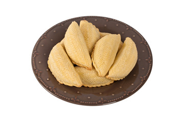 Ramadan Sweet Pastry called Shekerbura from Azerbaijan on white background. Selective focus.