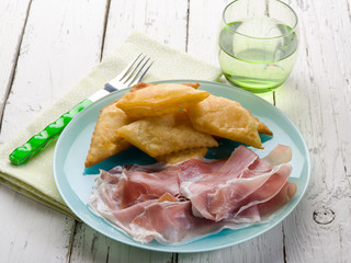 gnocco fritto with parma ham, traditional parma recipe