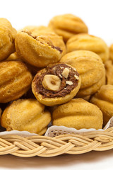 Walnut shaped cookies with caramel and walnuts - Russian Oreshki. Selective focus.