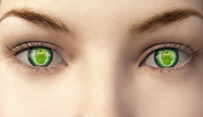 Obraz premium woman with fruit in here eyes