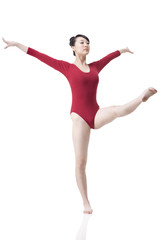 Obraz premium Female gymnast performing rhythmic gymnastics