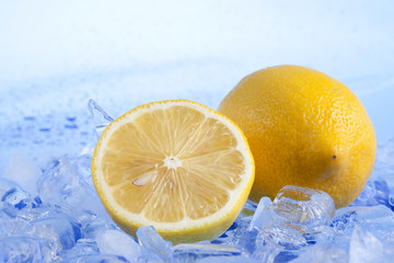 Fresh lemon and ice cubes