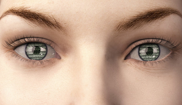 woman with binairy code in here eyes