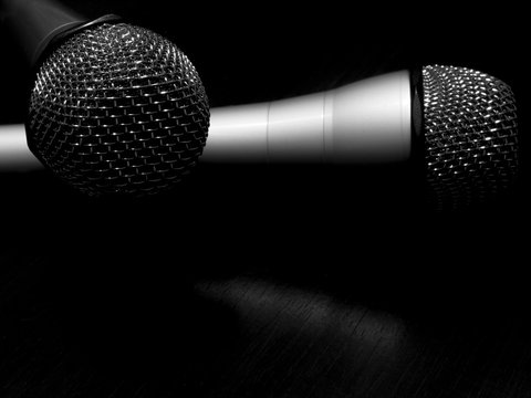 black and white two microphones concept