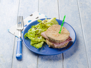 eggplant sandwich stuffed with ham and lettuce salad