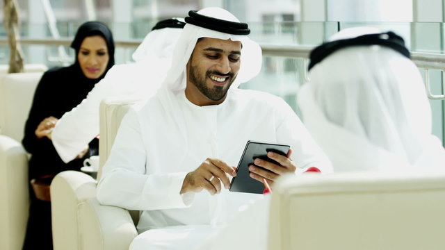 Arabic male female business Gulf Region city insurance growth tablet technology