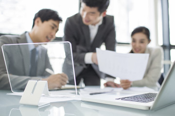 Young business person talking in meeting