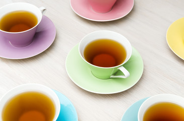 Colorful tea cups background
