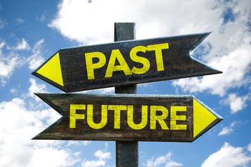 Past - Future signpost with sky background