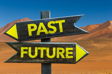 Past - Future signpost in a desert background