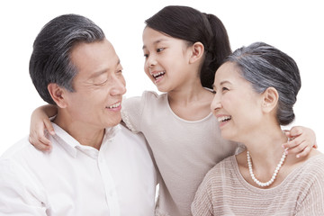 Cheerful granddaughter with grandparents