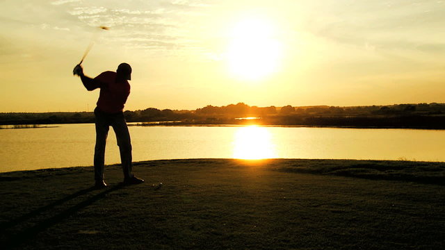 Healthy Outdoor Fitness Exercise Male Caucasian Golf Player Outdoors Sunset