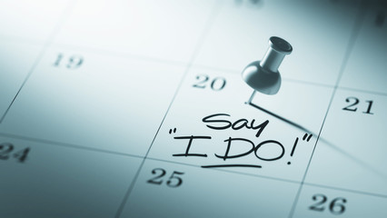 Concept image of a Calendar with a push pin. Closeup shot of a t