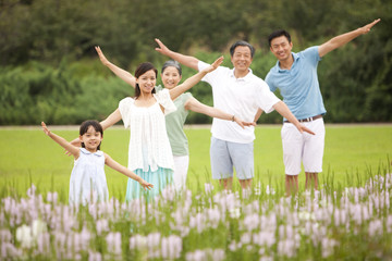 Happy family enjoying themselves outdoors