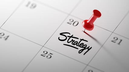 Concept image of a Calendar with a red push pin. Closeup shot of