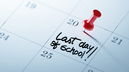 Concept image of a Calendar with a red push pin. Closeup shot of