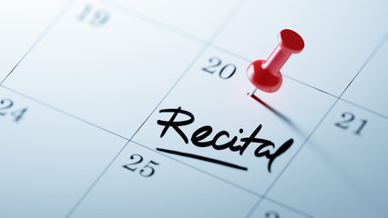 Concept image of a Calendar with a red push pin. Closeup shot of