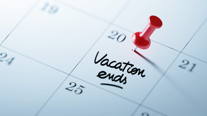 Concept image of a Calendar with a red push pin. Closeup shot of