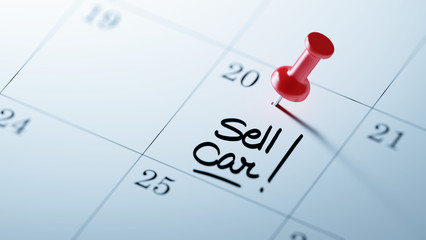 Concept image of a Calendar with a red push pin. Closeup shot of