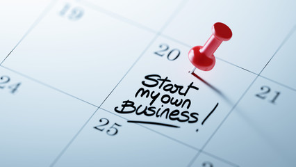 Concept image of a Calendar with a red push pin. Closeup shot of