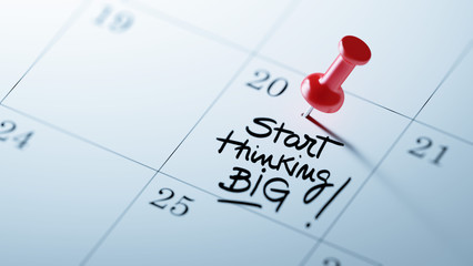 Concept image of a Calendar with a red push pin. Closeup shot of