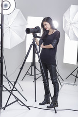 Photographer taking picture in studio
