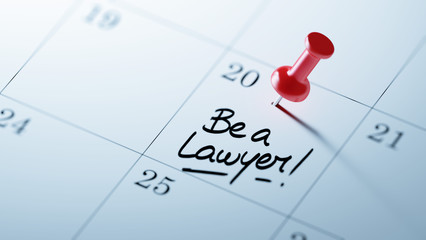 Concept image of a Calendar with a red push pin. Closeup shot of