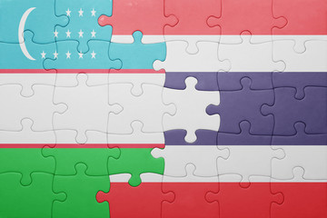 Fototapeta premium puzzle with the national flag of uzbekistan and thailand