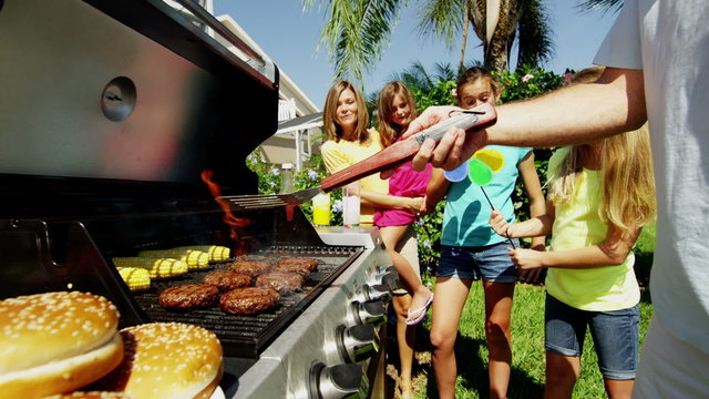Healthy Lifestyle BBQ Cooking Lunch Caucasian Family Three Daughters Home Garden