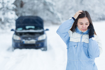 Car breakdown on winter road.