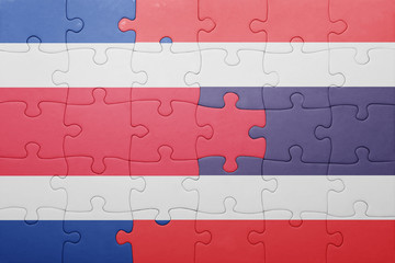 puzzle with the national flag of costa rica and thailand