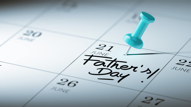 Concept image of a Calendar with a blue push pin. Closeup shot o