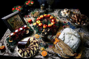 Cakes and advent wreath on a large table