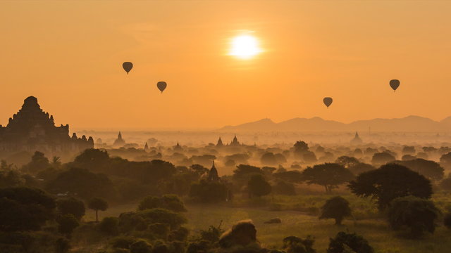 Ancient Empire Bagan Of Myanmar (Burma) And Balloons On Sunrise (pan shot)