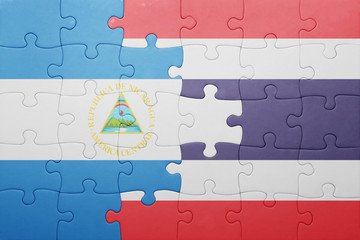 puzzle with the national flag of nicaragua and thailand