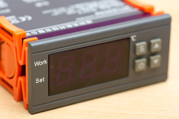 Digital controller temperature alarm security