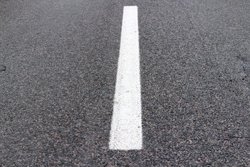 White stripe on the asphalt