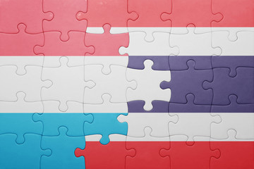 Fototapeta premium puzzle with the national flag of luxembourg and thailand