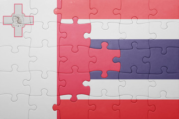 Fototapeta premium puzzle with the national flag of malta and thailand