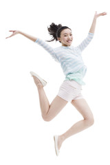 Happy young woman jumping